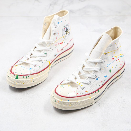 white converse with paint splatter