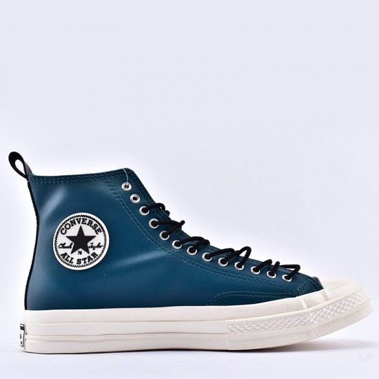 navy blue leather converse